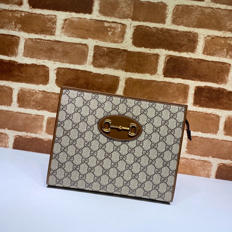 G*u*i clutch bags